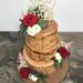 Hochzeitstorte - Baumstamm mit Blumen, bemalte und modellierte Aussenseite der Torte in Optik der Baumrinde mit Cake Topper