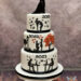 Hochzeitstorte - Die Geschichte der Liebe wird hier in vier Szenen auf der Torte erzählt und gekrönt von einem Caketopper.