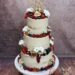 Hochzeitstorte - Feigen und andere Früchte verzieren die dreistöckige Semi Naked Cake welche ein Caketopper krönt.