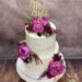 Hochzeitstorte - Rosa Blumentraum auf den beiden Torten. Auf der 2-stöckigen Torte wurde noch ein Caketopper angebracht.
