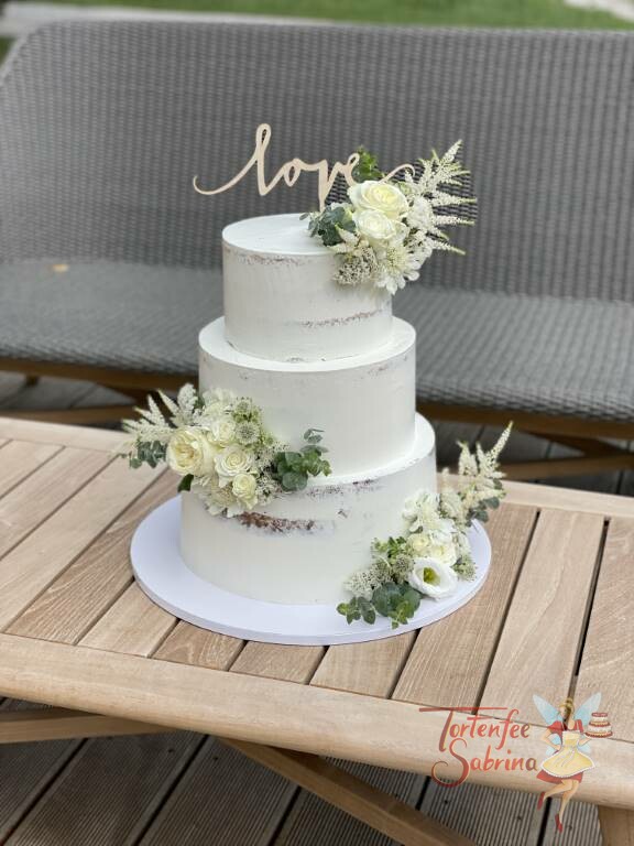 Hochzeitstorte - Rosen mit Eukalyptusblättern wurden zu Sträußen gebunden und dekorieren die Torte sowie der Cake Topper.