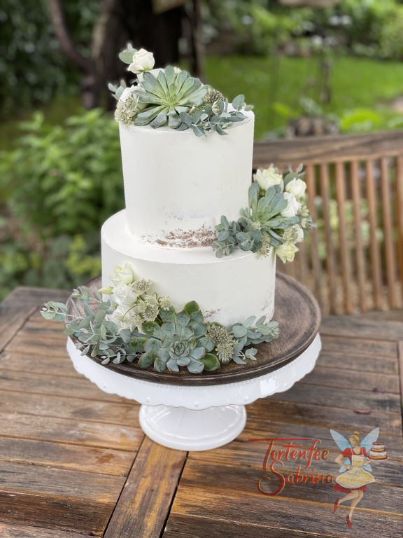 Hochzeitstorte - Weiß mit Sukkulenten, die 2 stöckige Torte wurde dünn eingestrichen und mit schönem grün verziert.