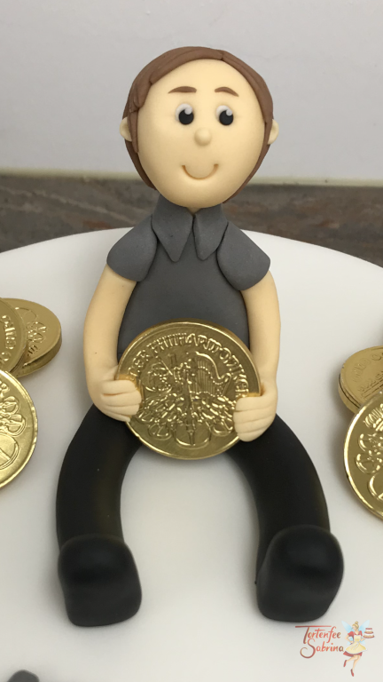 Jahrestagstorte - Mit Münzen in die Pension, zeigt den Münzmeister mit seinem gold glänzenden Tageswerk.
