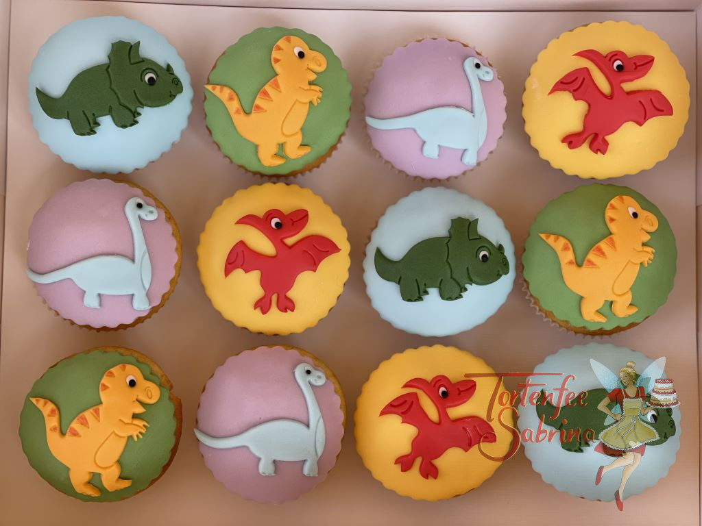 Muffins - Viele kleine Dinos sind auf den unterschiedlichen Hintergründen zu sehen. Sie wurden mit viel Liebe zum Detail verziert.