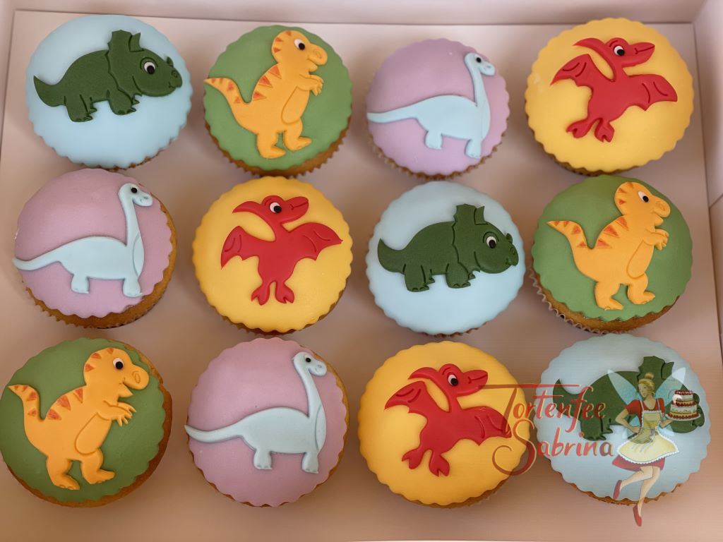 Muffins - Viele kleine Dinos sind auf den unterschiedlichen Hintergründen zu sehen. Sie wurden mit viel Liebe zum Detail verziert.