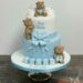 Tauftorte - Die drei Bären vergnügen sich auf der Torte, unten ist der Name auf Würfeln abgebildet und oben stehen Schüchen.